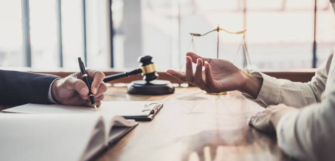 Male lawyer or judge consult having team meeting with Businesswoman client