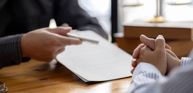 lient was listening to a lawyer advising on an embezzlement case, explaining the details of the proceeding and gathering evidence to file a lawsuit against the defendant