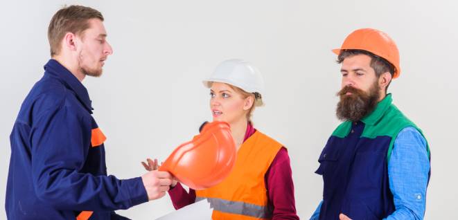 Builders and engineer arguing, misunderstanding